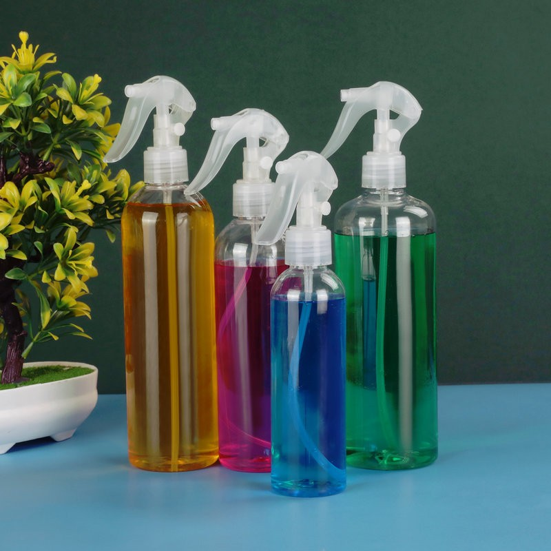 Transparent plastic spray bottle