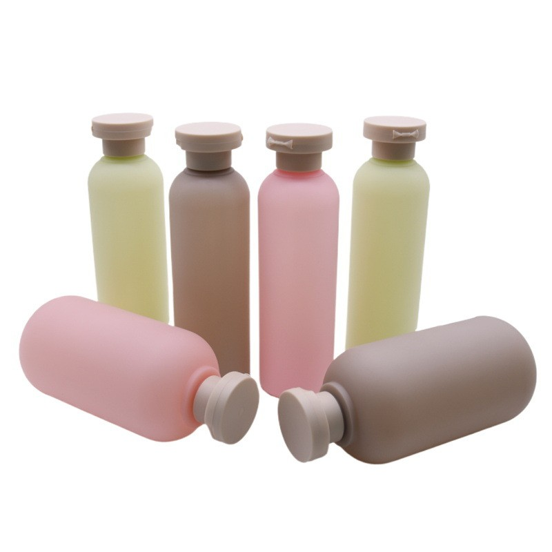 Round shoulder frosted clamshell lotion bottle