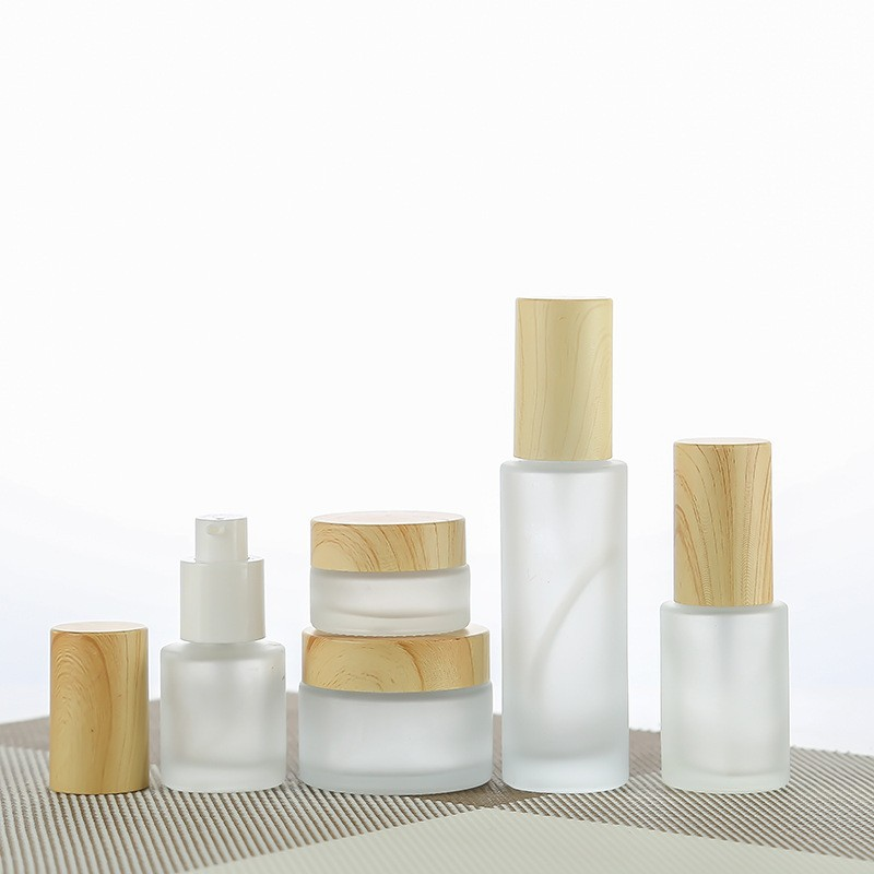 Wood grain covered glass cosmetic set bottle