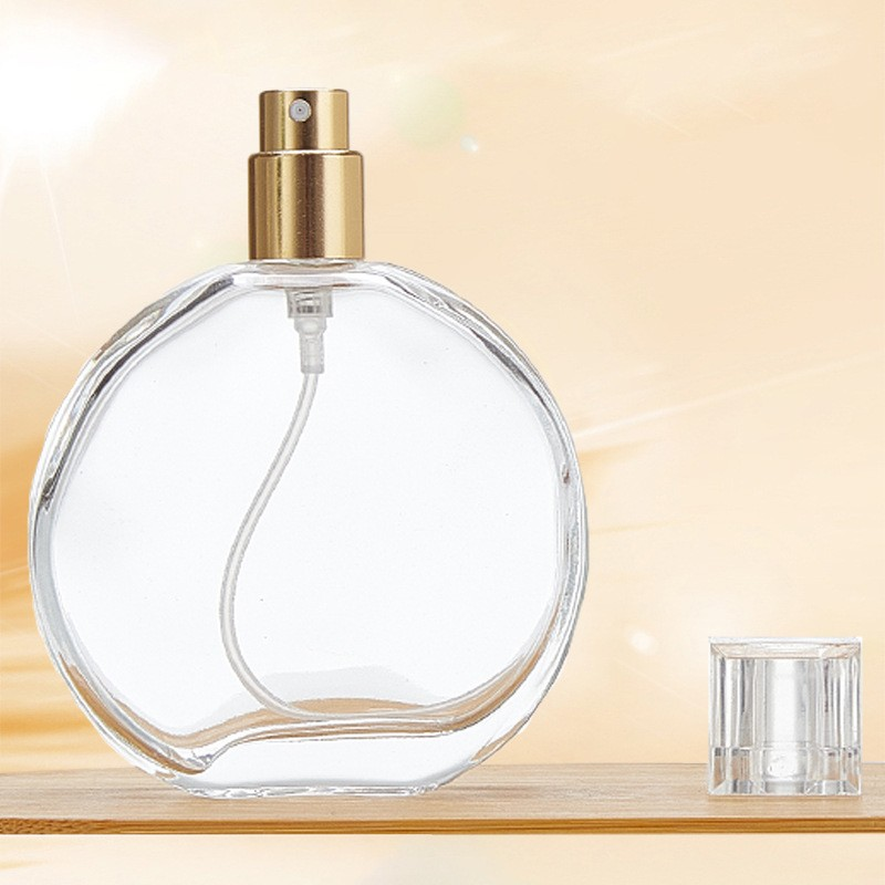 Flat round spray glass perfume bottle