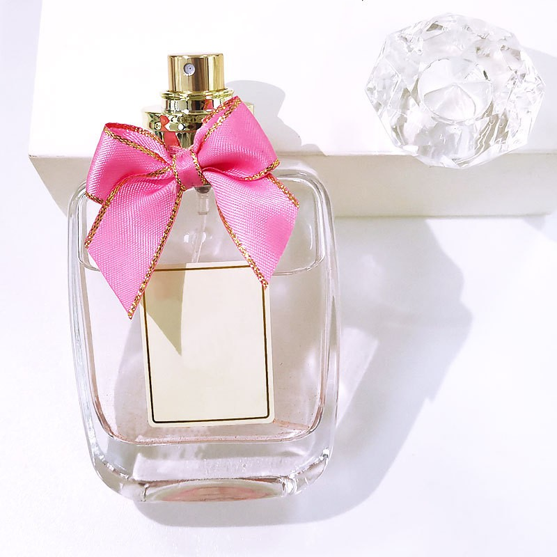 55ml wholesale gorgeous bow perfume glass packaging bottle transparent flat spray fragrance bottle